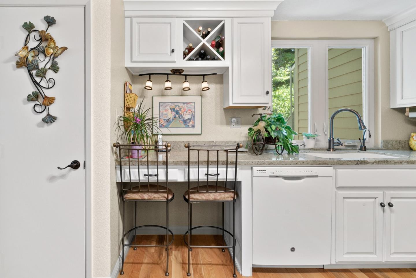 103 Stoney Creek Road Santa Cruz, CA 95060 - Photo 20 of 44 a kitchen with a table and chairs