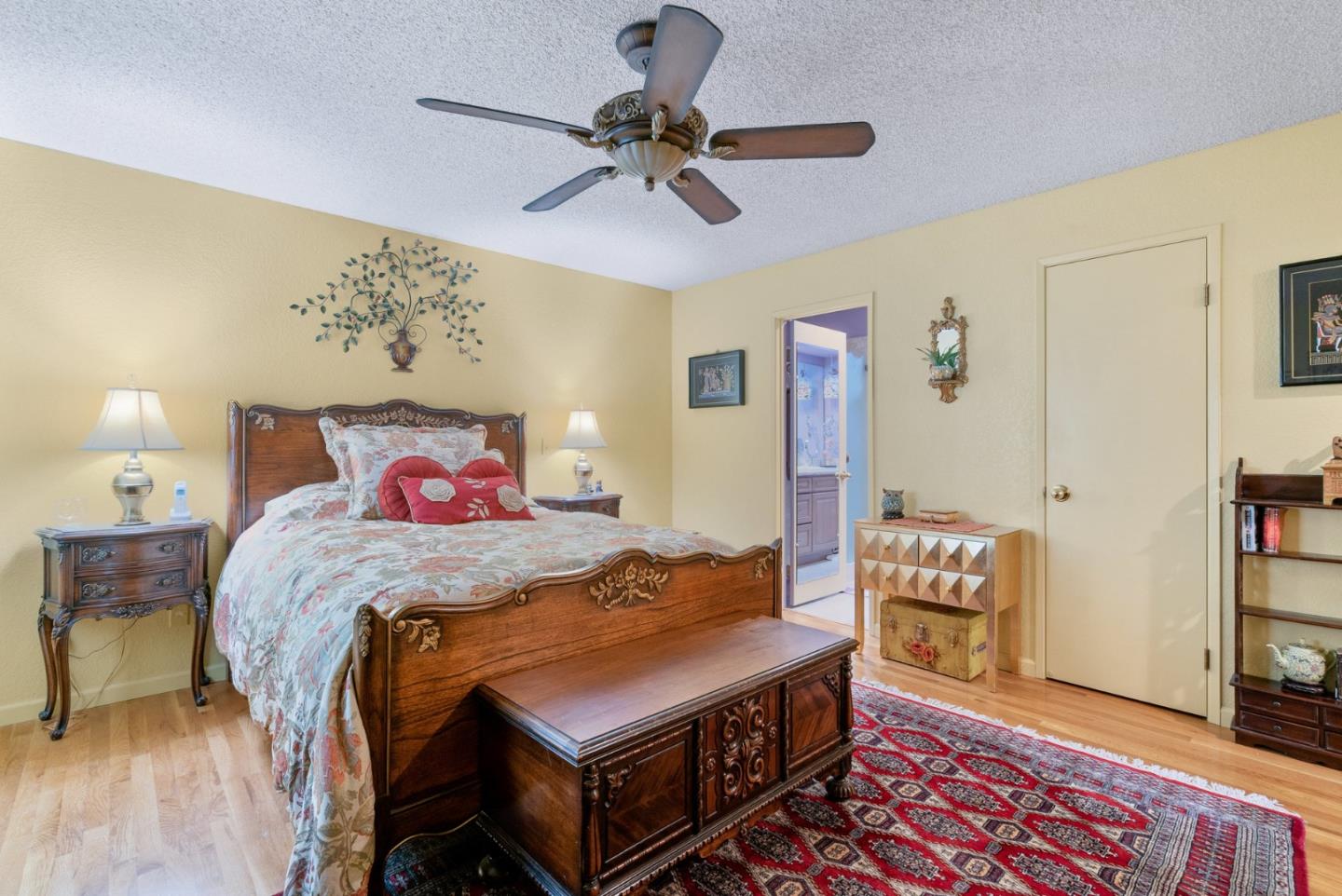 103 Stoney Creek Road Santa Cruz, CA 95060 - Photo 26 of 44 a bedroom with a bed and a chandelier