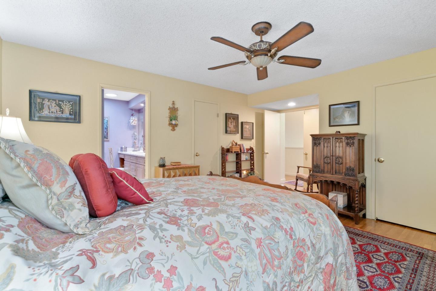 103 Stoney Creek Road Santa Cruz, CA 95060 - Photo 27 of 44 a bed room with a bed and a chandelier