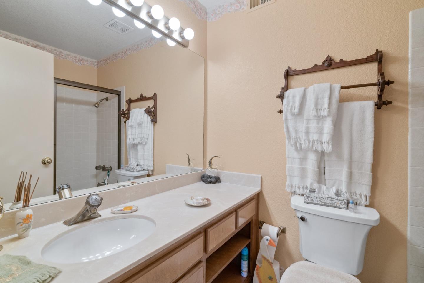 103 Stoney Creek Road Santa Cruz, CA 95060 - Photo 31 of 44 a bathroom with a sink double vanity and a mirror