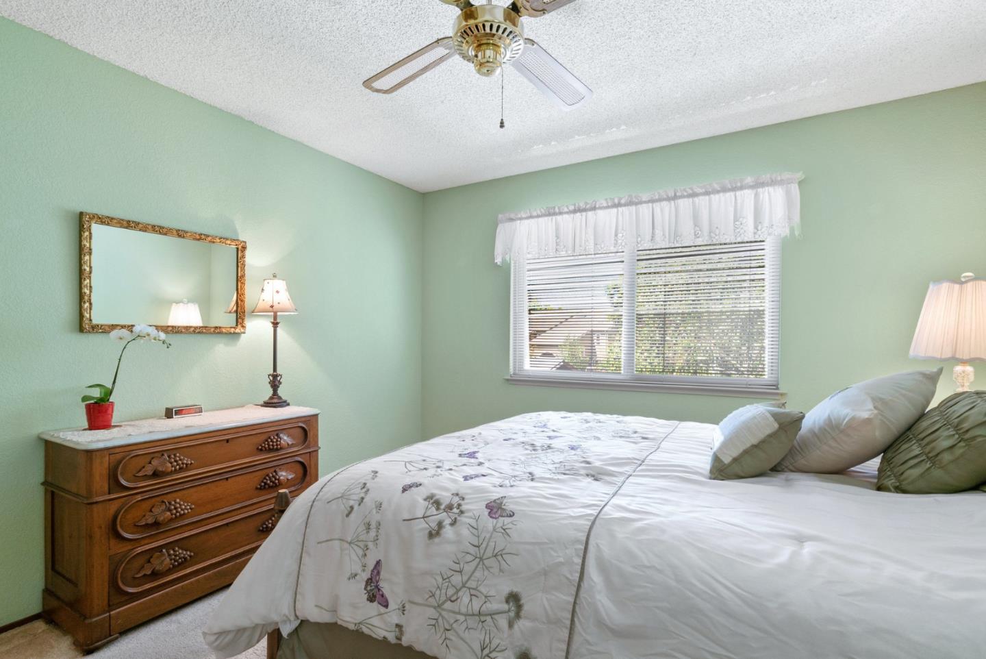 103 Stoney Creek Road Santa Cruz, CA 95060 - Photo 33 of 44 a bedroom with a bed and a dresser