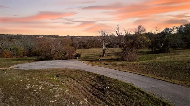a view of a yard with mountain view