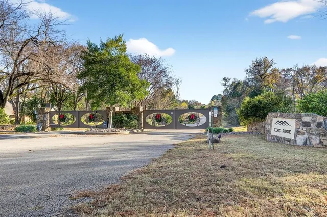 a view of a road with a building in the background