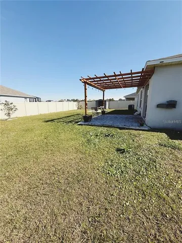 a view of a room with an outdoor space