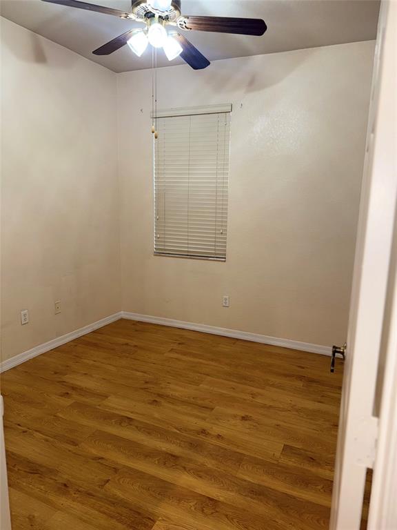 9073 Plymouth Place Tamarac, FL 33321 - Photo 12 of 16 a view of an empty room with a window