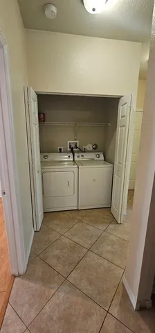 a kitchen with a refrigerator sink and stove