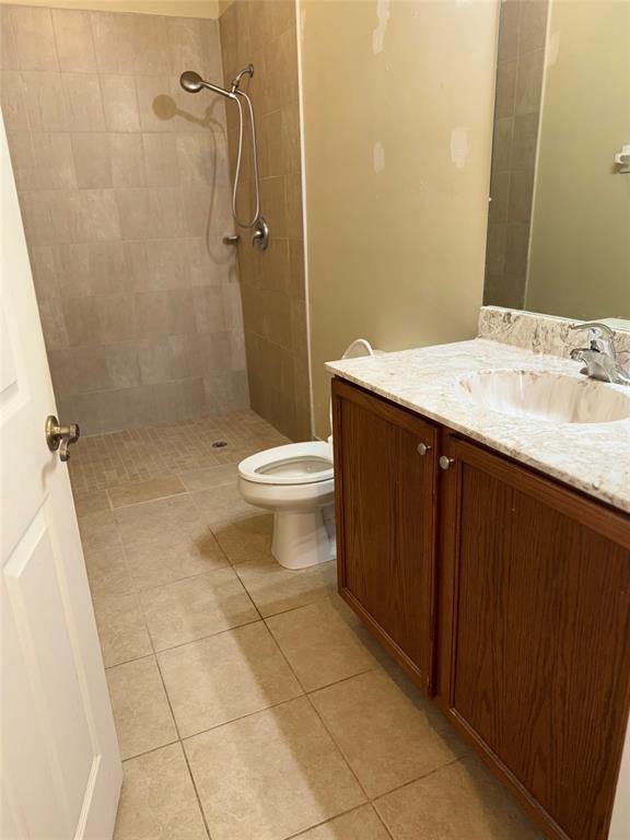 9073 Plymouth Place Tamarac, FL 33321 - Photo 6 of 16 a bathroom with a sink a toilet and shower