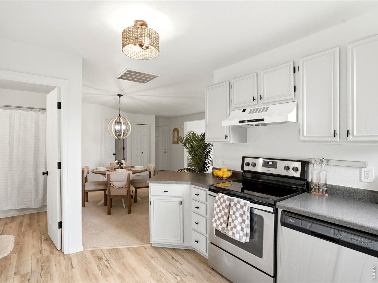 4945 Twin Lakes Road, Unit 46 Boulder, CO 80301 - Photo 22 of 42 Looking back toward the dining area, the open-concept design makes entertaining effortless.