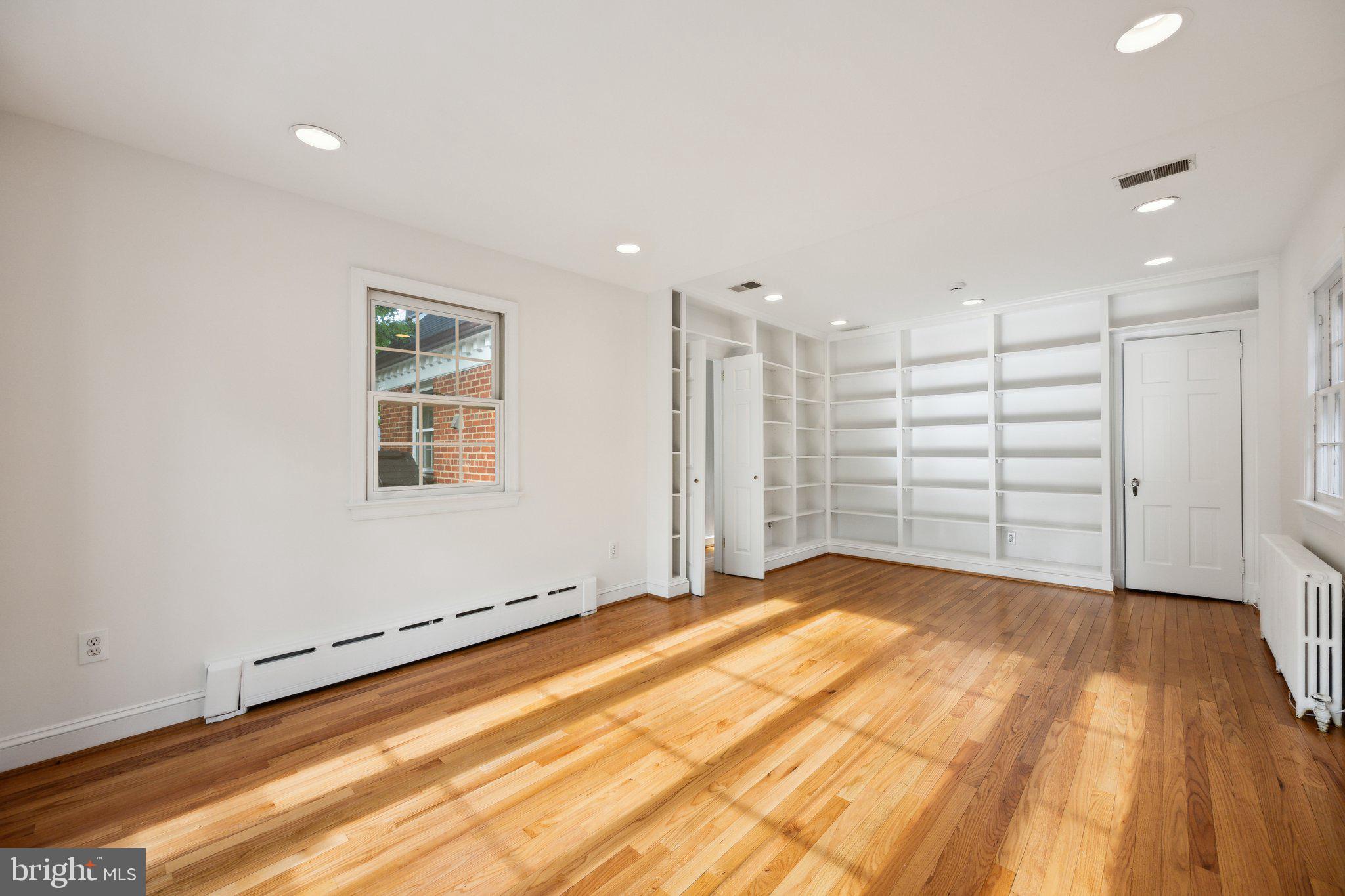 7820 Custer Road Bethesda, MD 20814 - Photo 18 of 29 a view of an empty room with a window