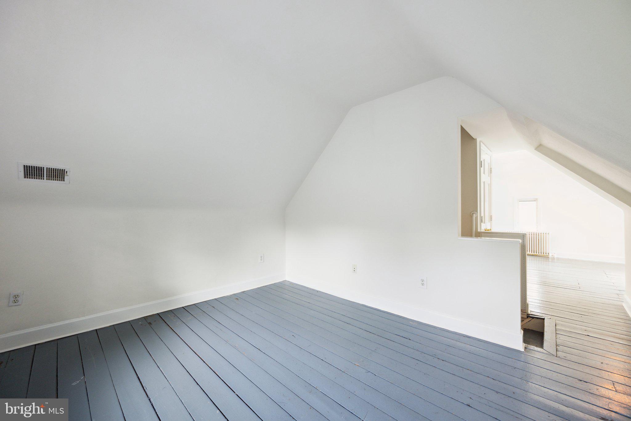 7820 Custer Road Bethesda, MD 20814 - Photo 23 of 29 a view of a room with wooden floor and small space