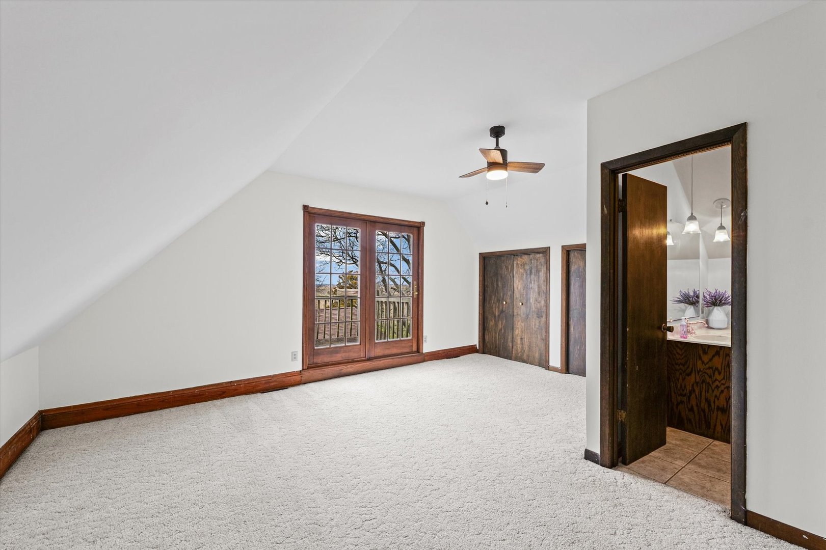 7961 North 3000 E Road Forrest, IL 61741 - Photo 27 of 66 an empty room with windows and closet