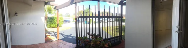 a kitchen with a sink stove and refrigerator