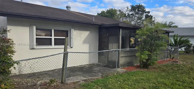 a view of a porch with a bench
