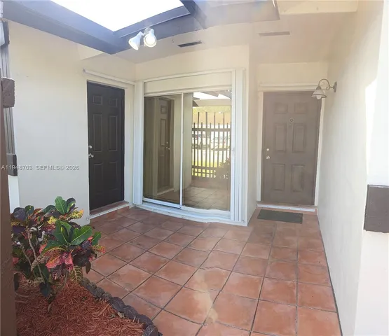 a view of entryway with livingroom