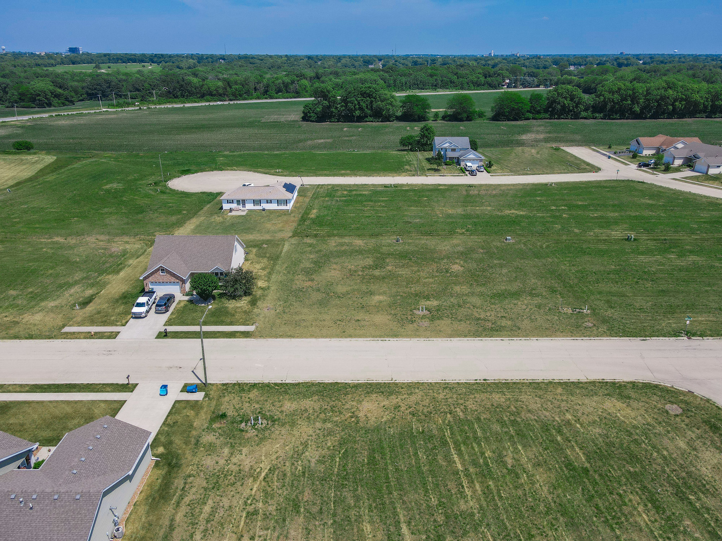 1408 Indian Trail Kankakee, IL 60901 - Photo 3 of 8 a view of a golf course with a lake