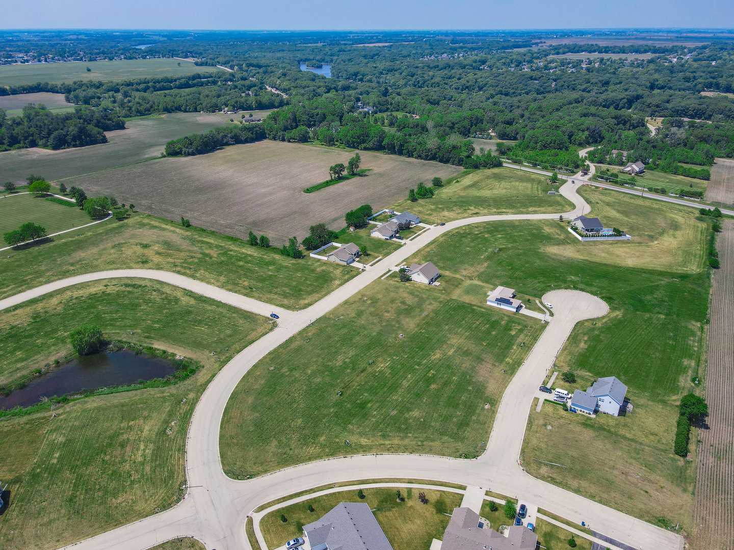 1408 Indian Trail Kankakee, IL 60901 - Photo 6 of 8 an aerial view of a golf course with a swimming pool