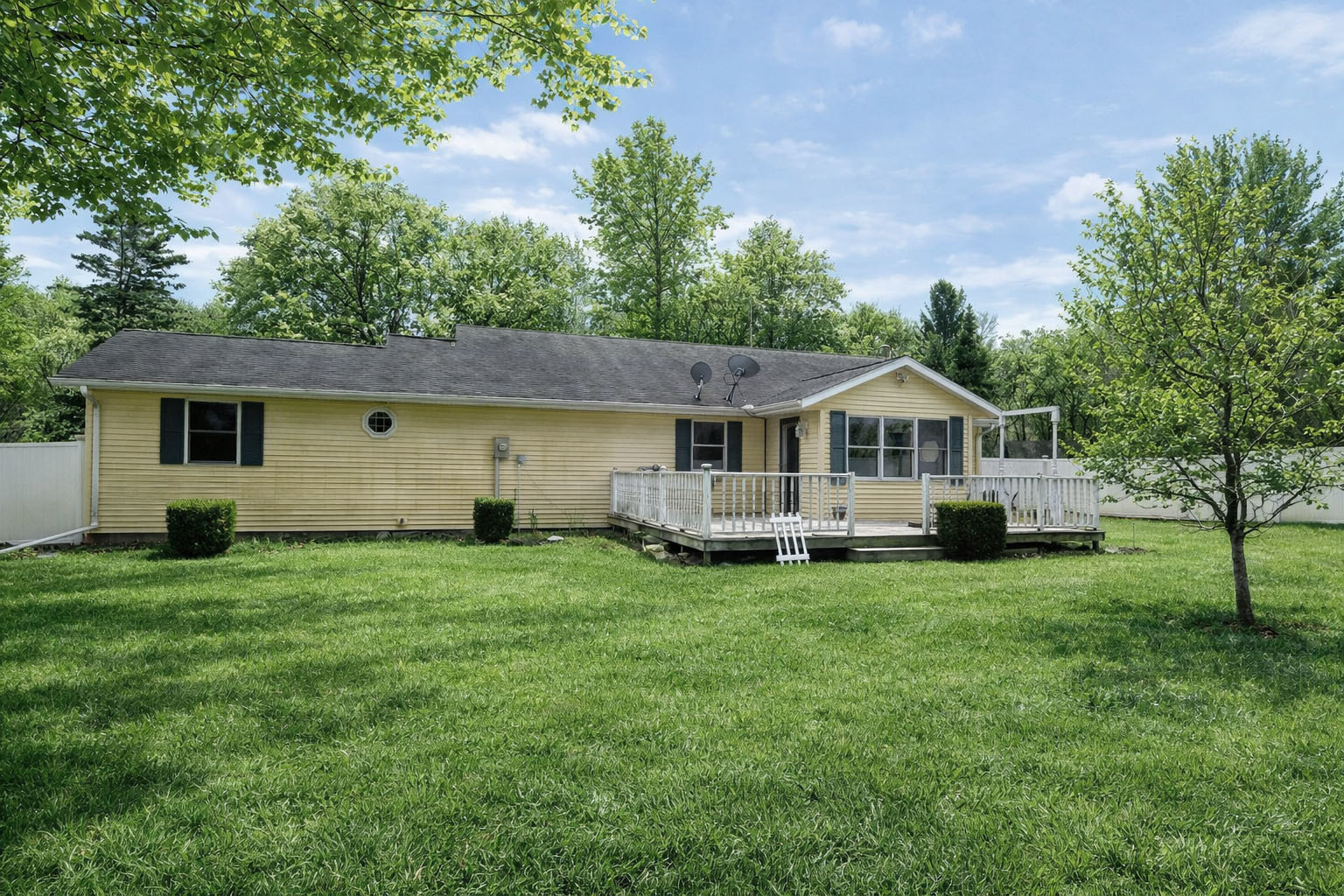 1115 South Clapper Court Mahomet, IL 61853 - Photo 12 of 14 a front view of a house with a garden