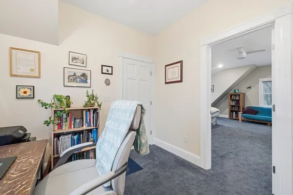 a view of a livingroom with furniture and toys
