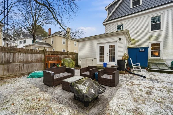 a backyard of a house with seating space