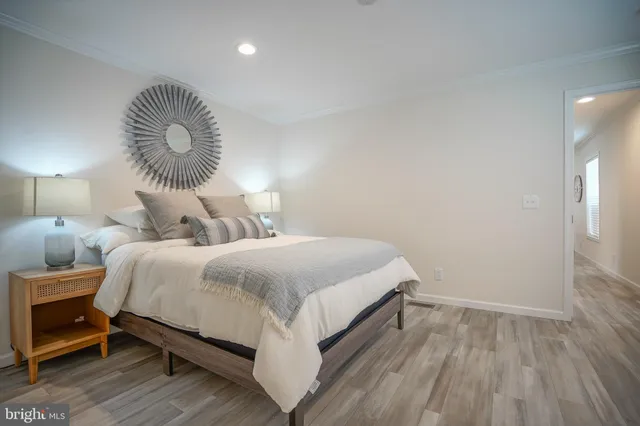 a bedroom with a bed and a chair