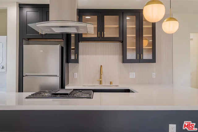 a bathroom with a sink a mirror and a window