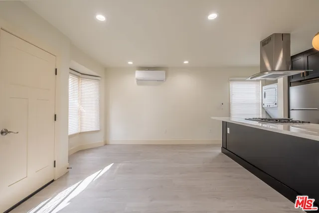 a view of kitchen with cabinets