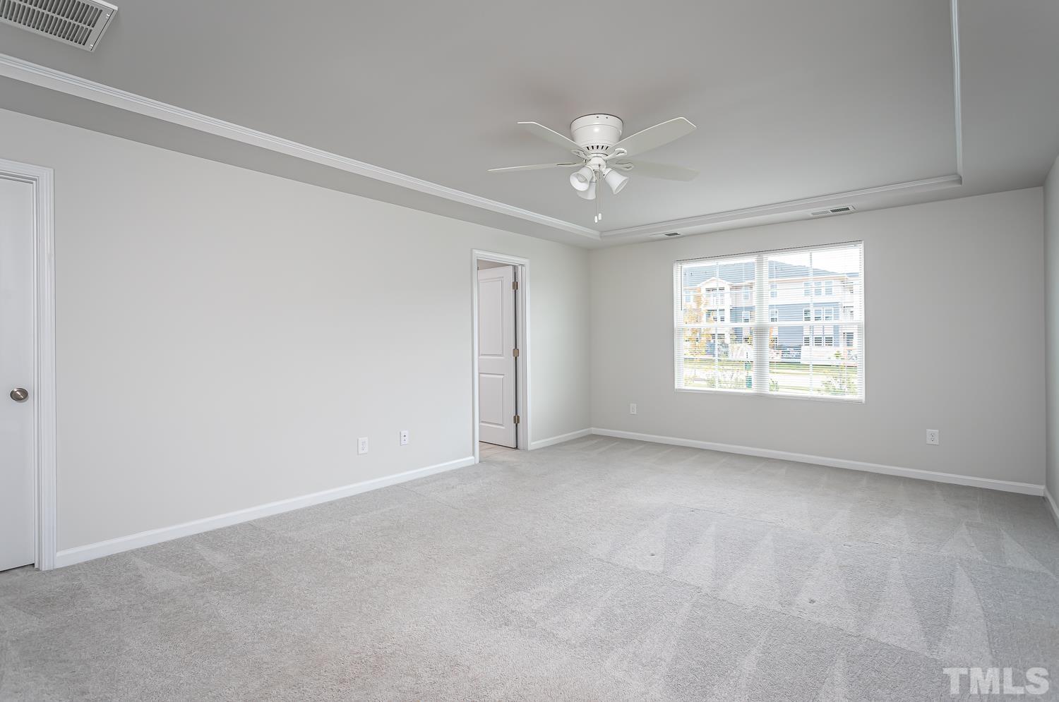 6531 Tremolo Trail Raleigh, NC 27616 - Photo 7 of 13 a view of an empty room with a window