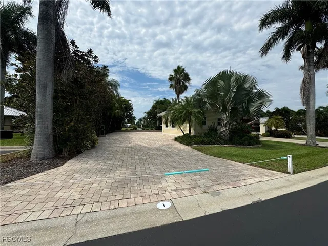 a view of a garden with a fountain
