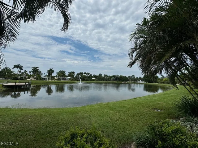 a view of a house with backyard porch and garden