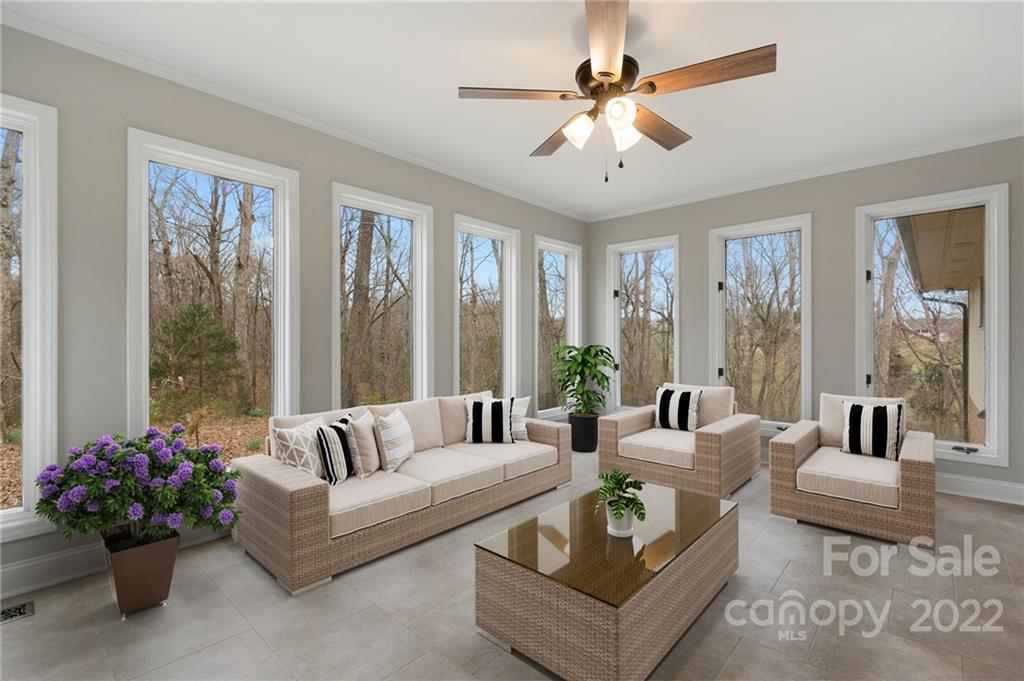 4418 Watson Church Road Marshville, NC 28103 - Photo 11 of 37 a living room with furniture and a large window