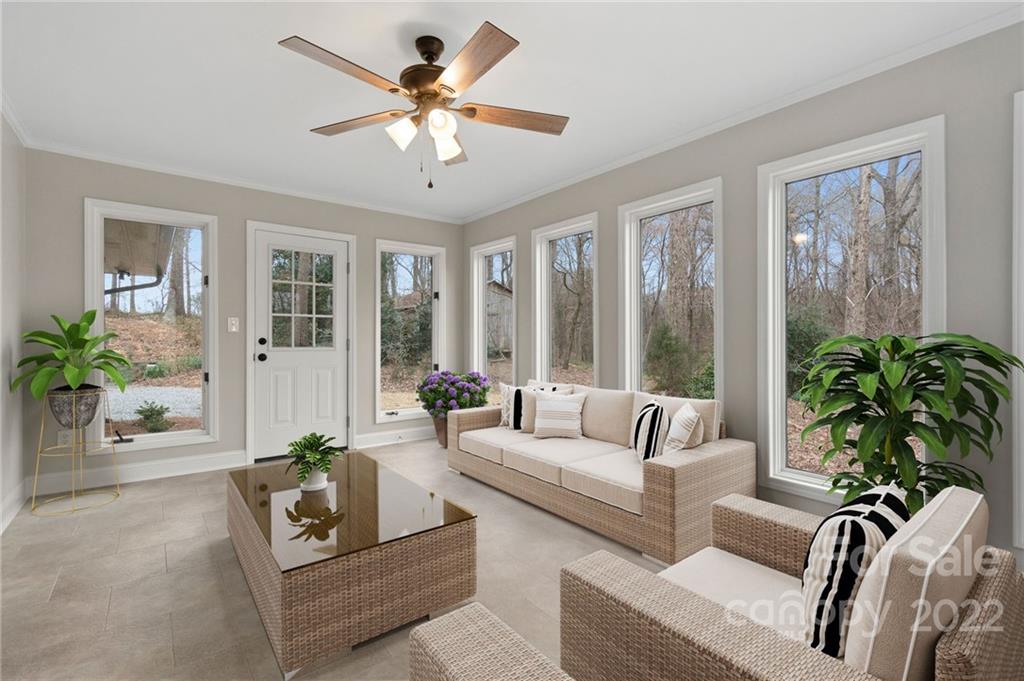 4418 Watson Church Road Marshville, NC 28103 - Photo 12 of 37 a living room with furniture and a large window