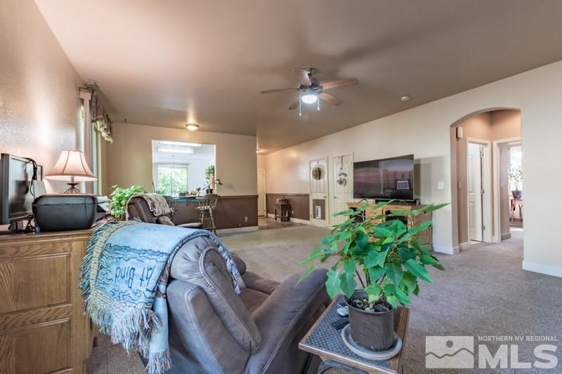 2771 Harding Way Reno, NV 89503 - Photo 12 of 24 a living room with furniture and a flat screen tv