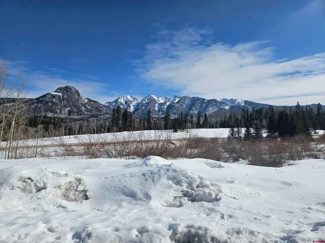a view of swimming pool with a yard