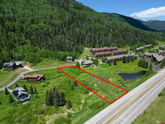 a view of a garden with a bench