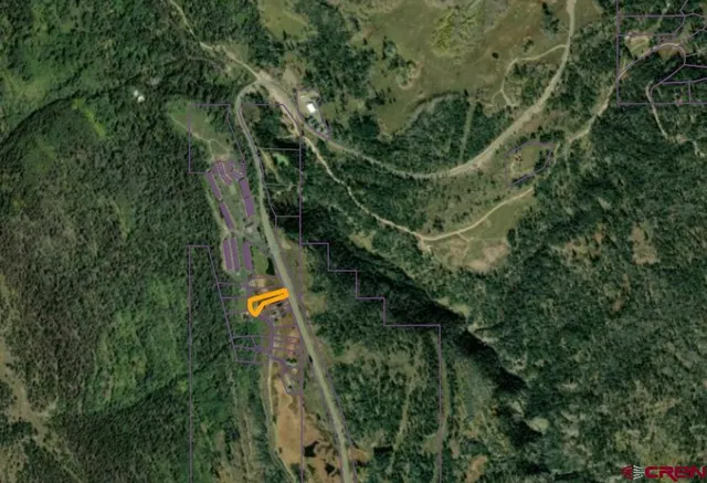 a view of a road with snow on the road