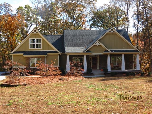 1880 Victory Church Road Bowdon, GA 30108 - Photo 1 of 1 a front view of a house with a yard