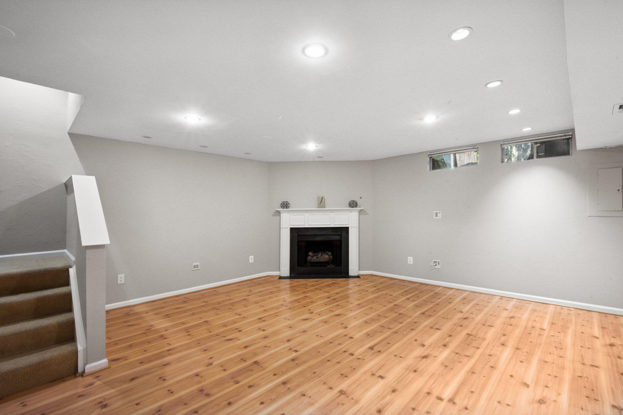 1319 Vintage Place Reston, VA 20194 - Photo 22 of 37 Finished Lower Level with Gas Fireplace