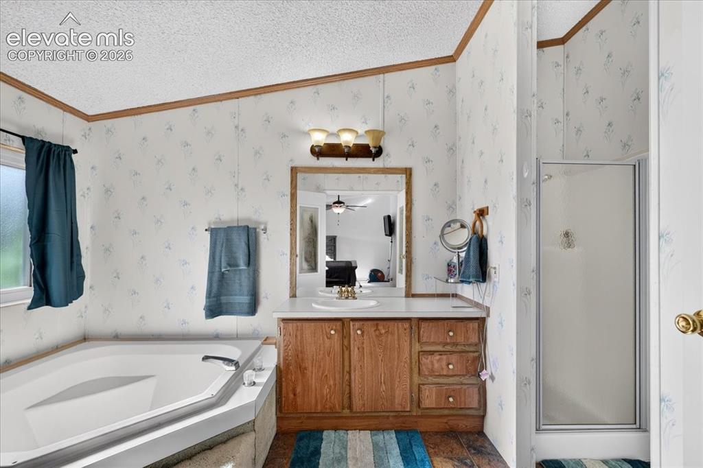 6210 Prospero Road Peyton, CO 80831 - Photo 8 of 26 En Suite Full primary bath