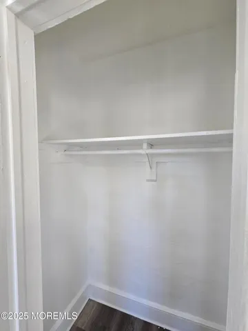 a view of small space with racks on the wall