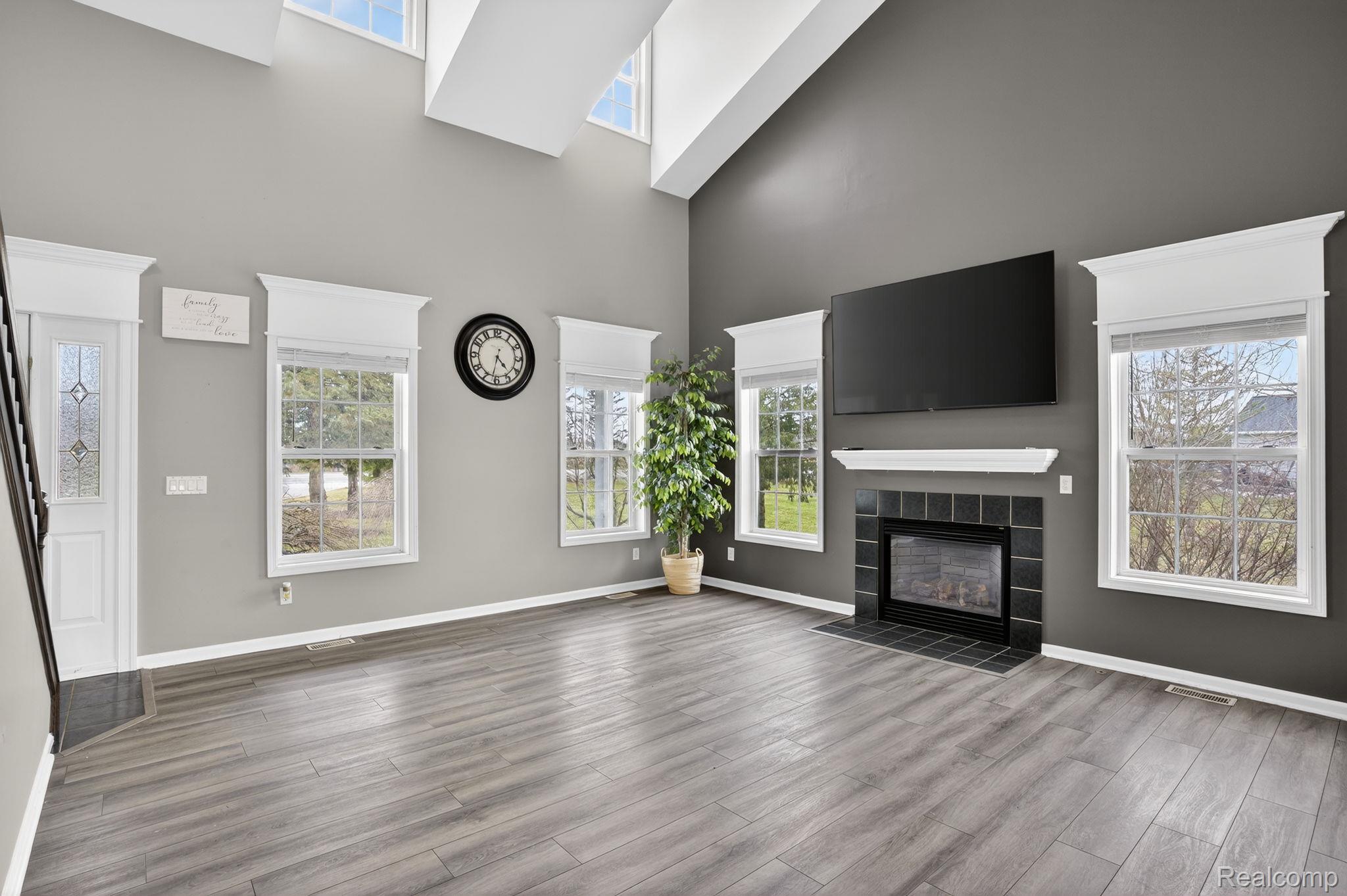9055 Hegel Road Grand Blanc, MI 48439 - Photo 18 of 62 Vaulted ceilings with architectural window accents