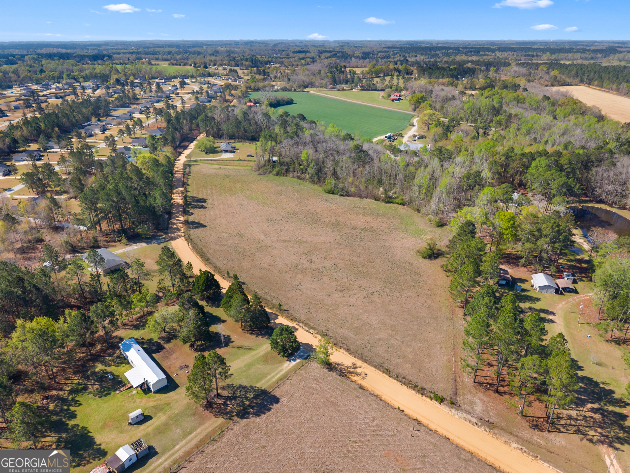 0 Lester Fordham Road Statesboro, GA 30458 - Photo 7 of 10 an aerial view of residential houses with outdoor space