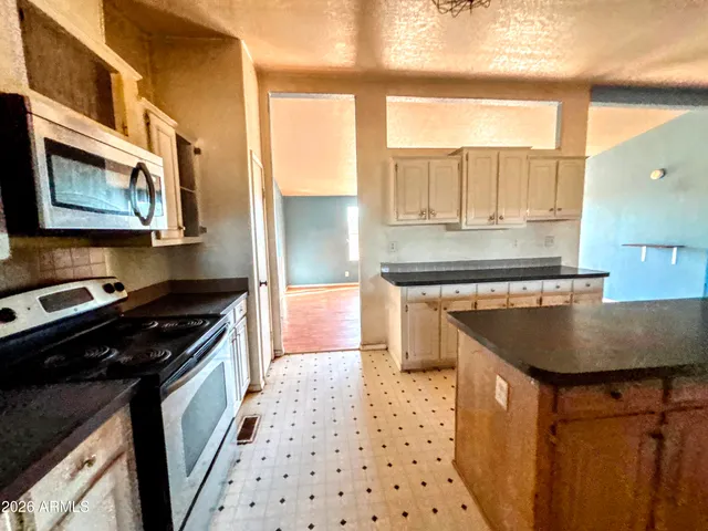 a view of a big yard with an empty space