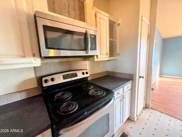 a bathroom with a sink and a shower