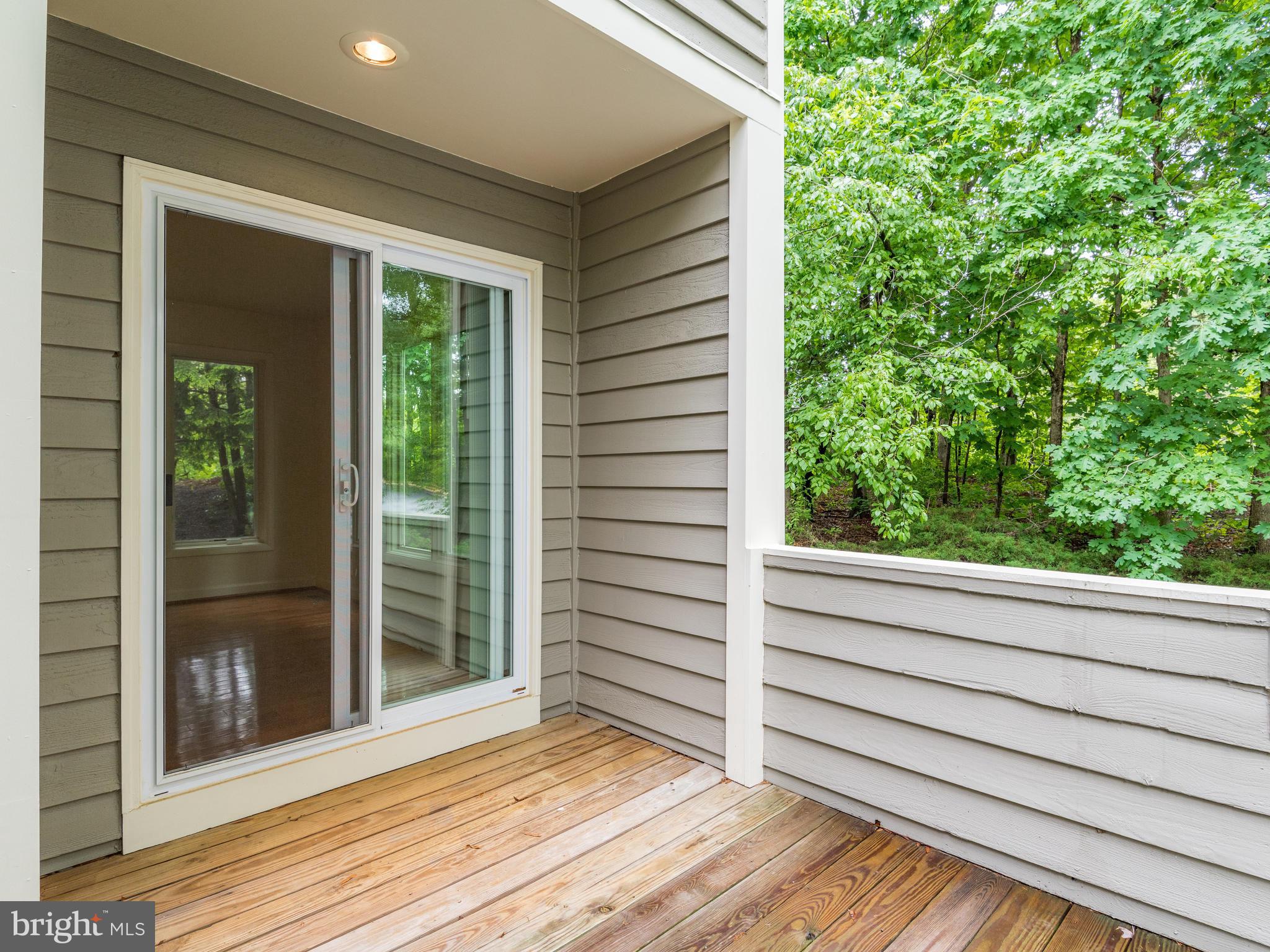 11121 Lakespray Way Reston, VA 20191 - Photo 22 of 29 Front deck (Pella doors and windows replaced)
