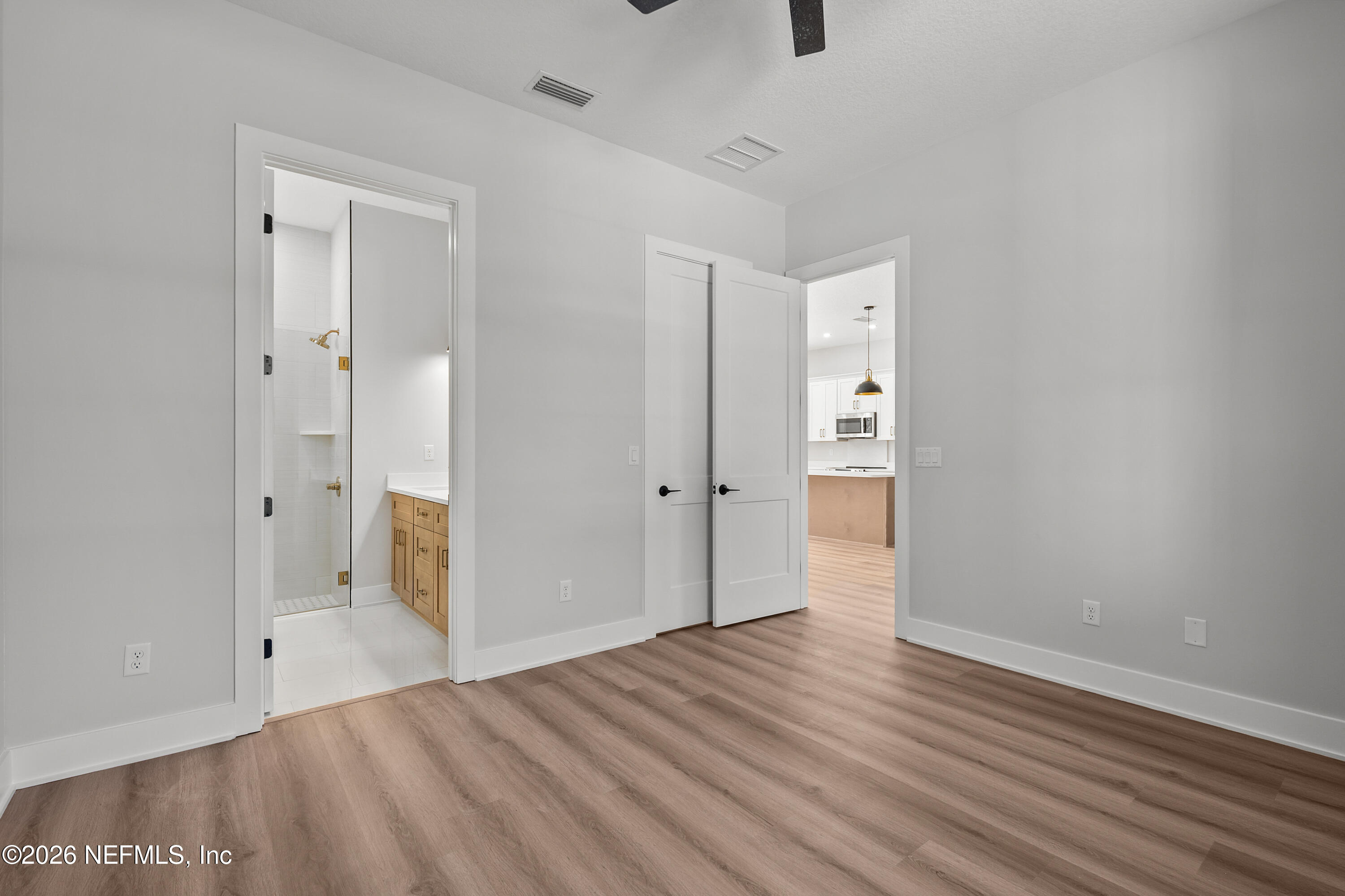 543 Palmetto Bluff Road Palatka, FL 32177 - Photo 14 of 23 a view of an empty room with wooden floor
