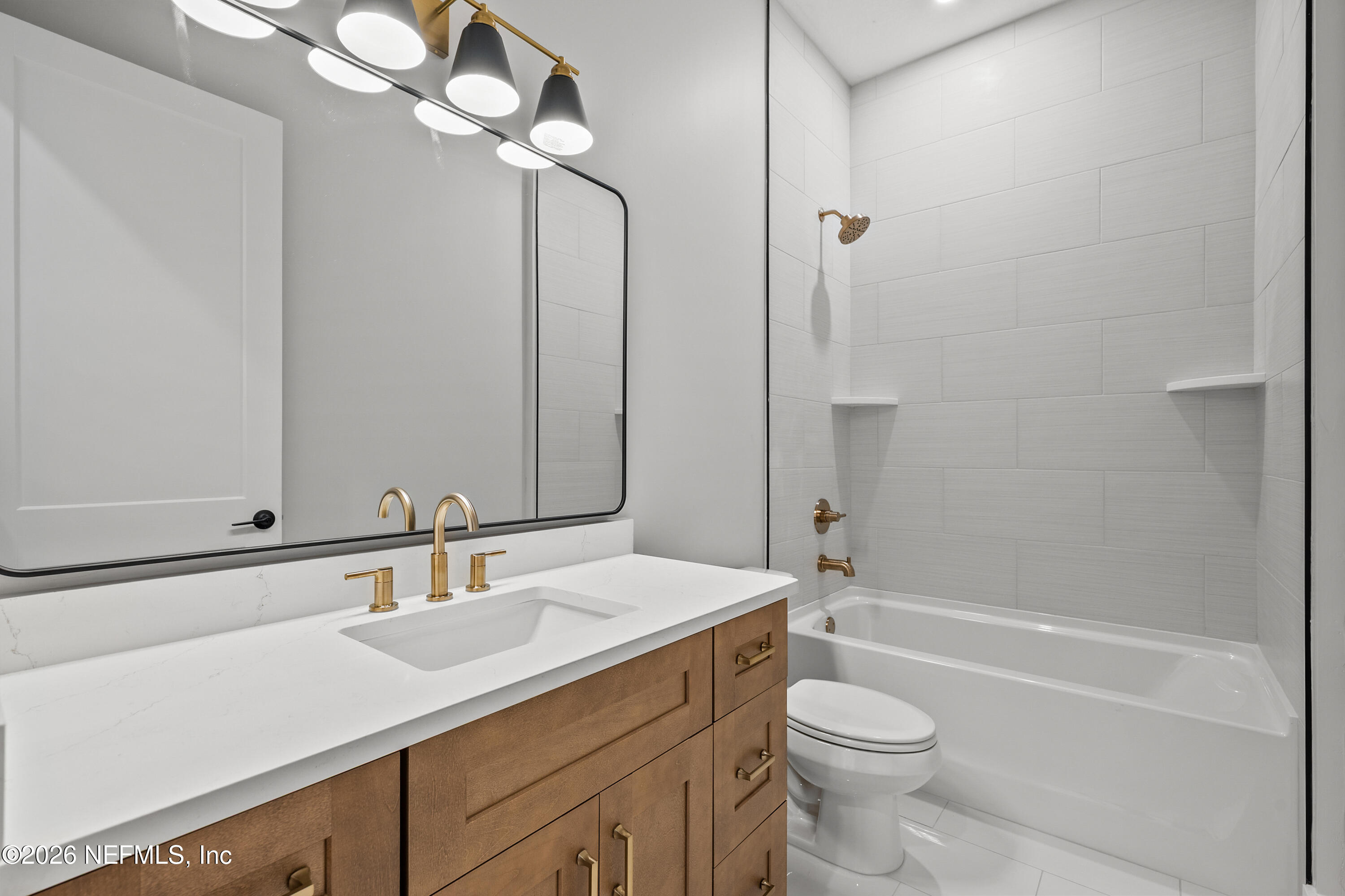 543 Palmetto Bluff Road Palatka, FL 32177 - Photo 19 of 23 a bathroom with a sink a toilet and shower