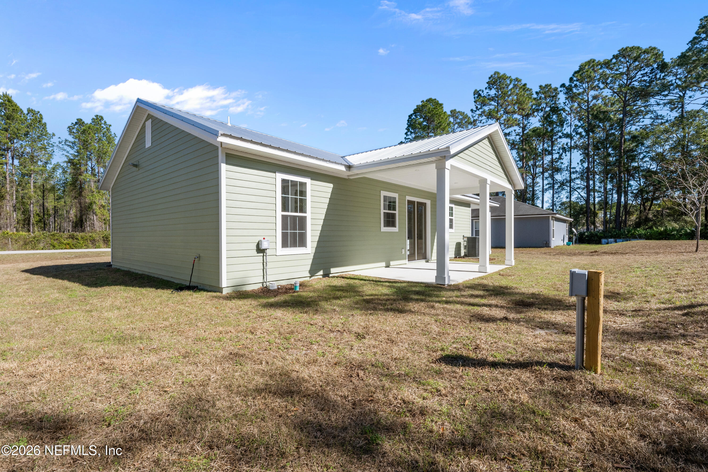 543 Palmetto Bluff Road Palatka, FL 32177 - Photo 23 of 23 a view of a house with a yard
