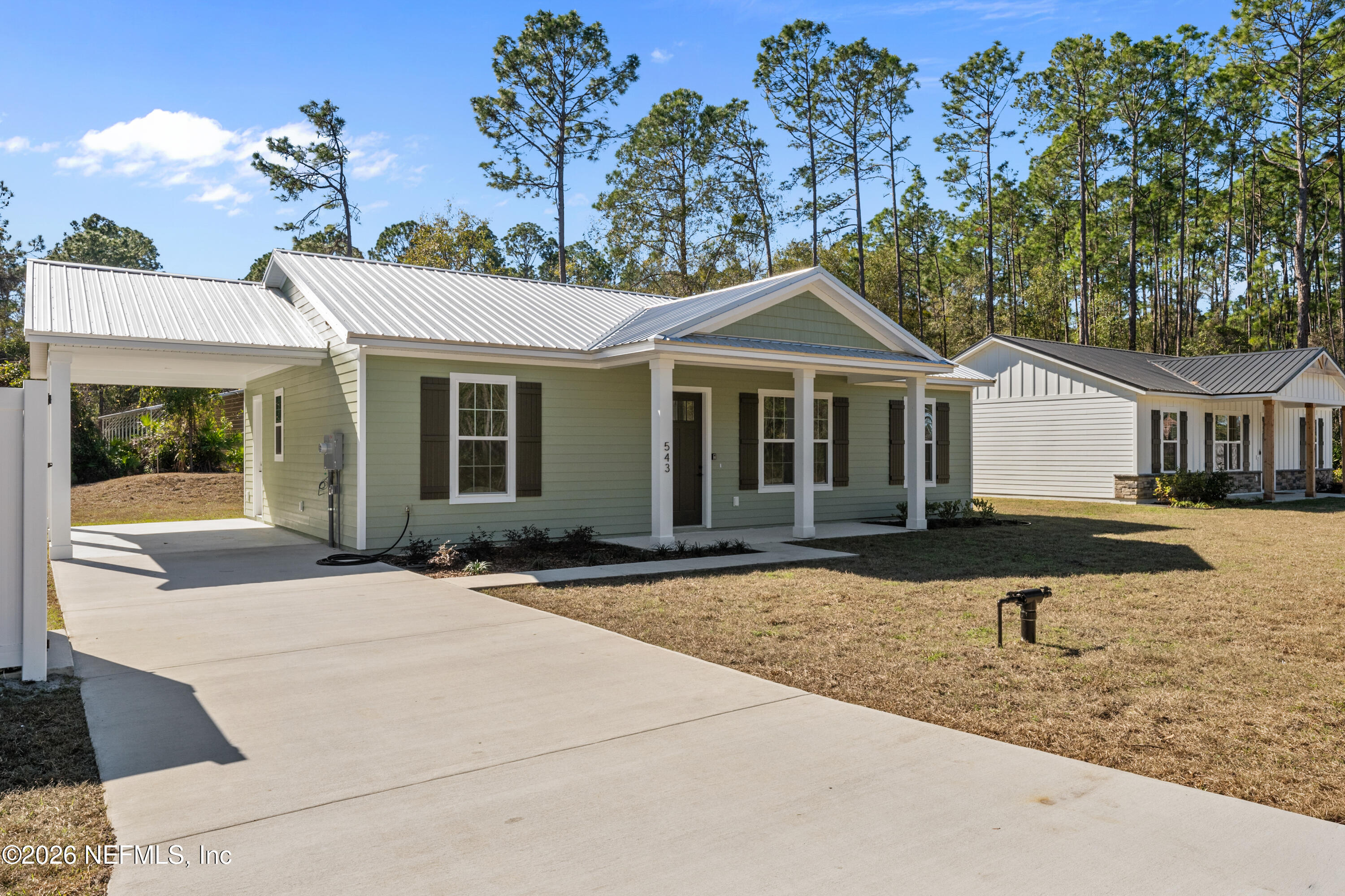 543 Palmetto Bluff Road Palatka, FL 32177 - Photo 6 of 23 a front view of a house with a yard