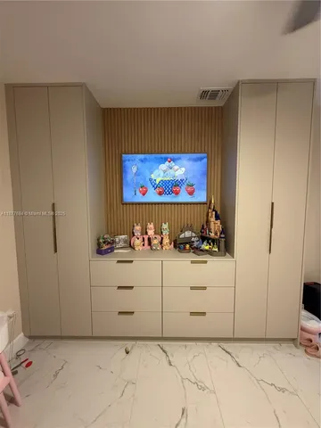 a view of a livingroom with wooden floor