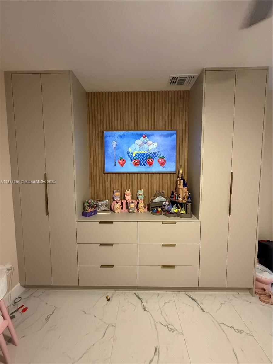 7684 Northwest 179th Street Hialeah, FL 33015 - Photo 10 of 13 a view of a livingroom with wooden floor